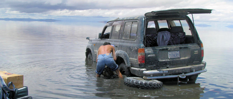 All four of the jeep's wheels broke through the salt